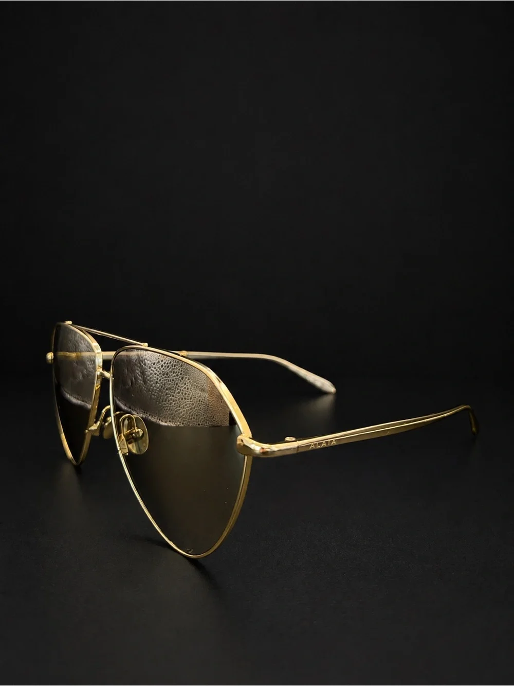 Alaïa Gold Frame Sunglasses with White Side Shields